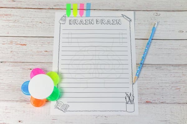 "Brain Drain" worksheet on table next to pencil and flower-shaped highlighter